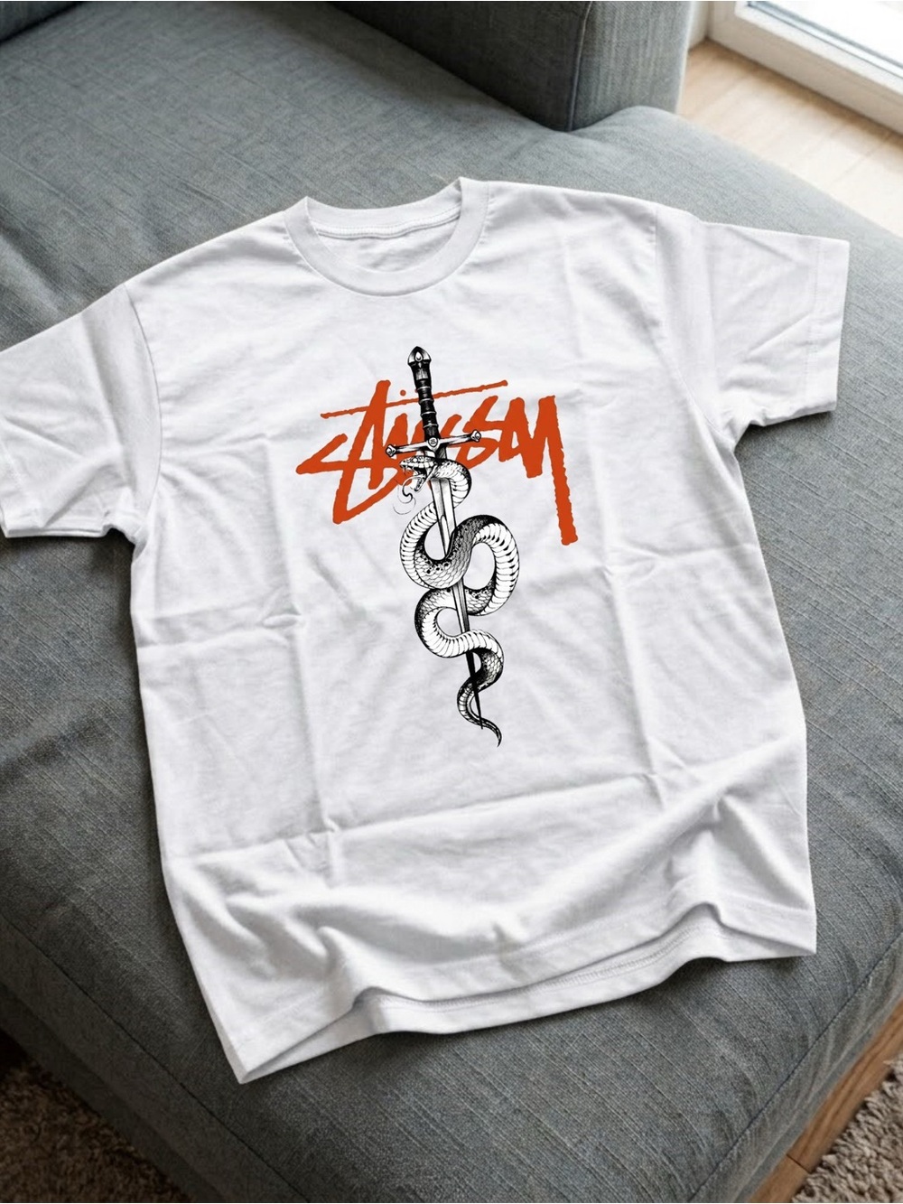 Gildan White Short-Sleeve Tee with Orange Script and Black Snake Dagger Graphic